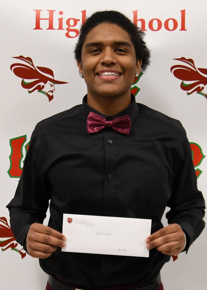 Maalik Madrigal received La Salle-Peru High School's Herbert W. Bekermeier Scholarship. The $1,000 scholarship is awarded to a graduating senior who has received a varsity letter for participation in track or basketball.