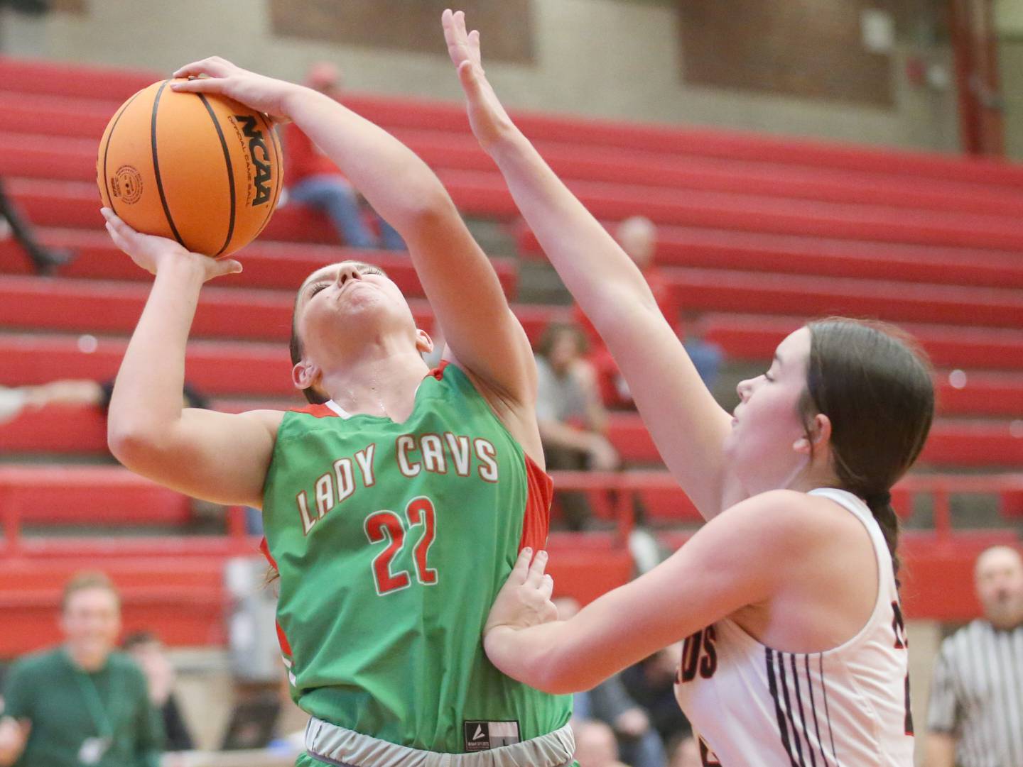 L-P's Brianna Ruppert rebounds a ball over Metamora's Kessa Sell during the Ottawa Girls Holiday Tournament on Monday, Dec. 16, 2024 in Kingman Gym at Ottawa High School.