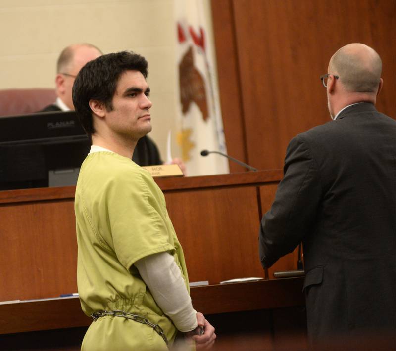 Jonathon Gounaris looks toward family members after a court hearing at the Ogle County Judicial Center in Oregon on Thursday, March 6, 2025. Also pictured are Judge John "Ben" Roe and Ogle County Assistant Public Defender Michael O'Brien.