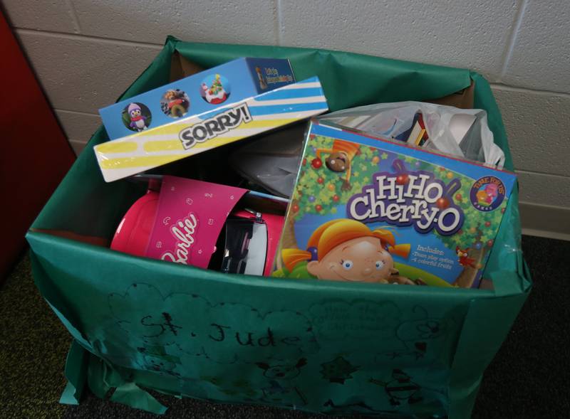 A view of the St. Jude box of un-wrapped toys during the Small School Big Hearts campaign on Tuesday, Dec. 2, 2025 at Dimmick School in La Salle. The “Small School, Big Hearts” campaign is a toy drive organizded by third graders and celebrates the power of kindness, generosity and community spirit. Gifts will be wrapped and sent to Officer Santa with the La Salle Police Department and St. Jude. The school is accepting donations through Dec. 12.