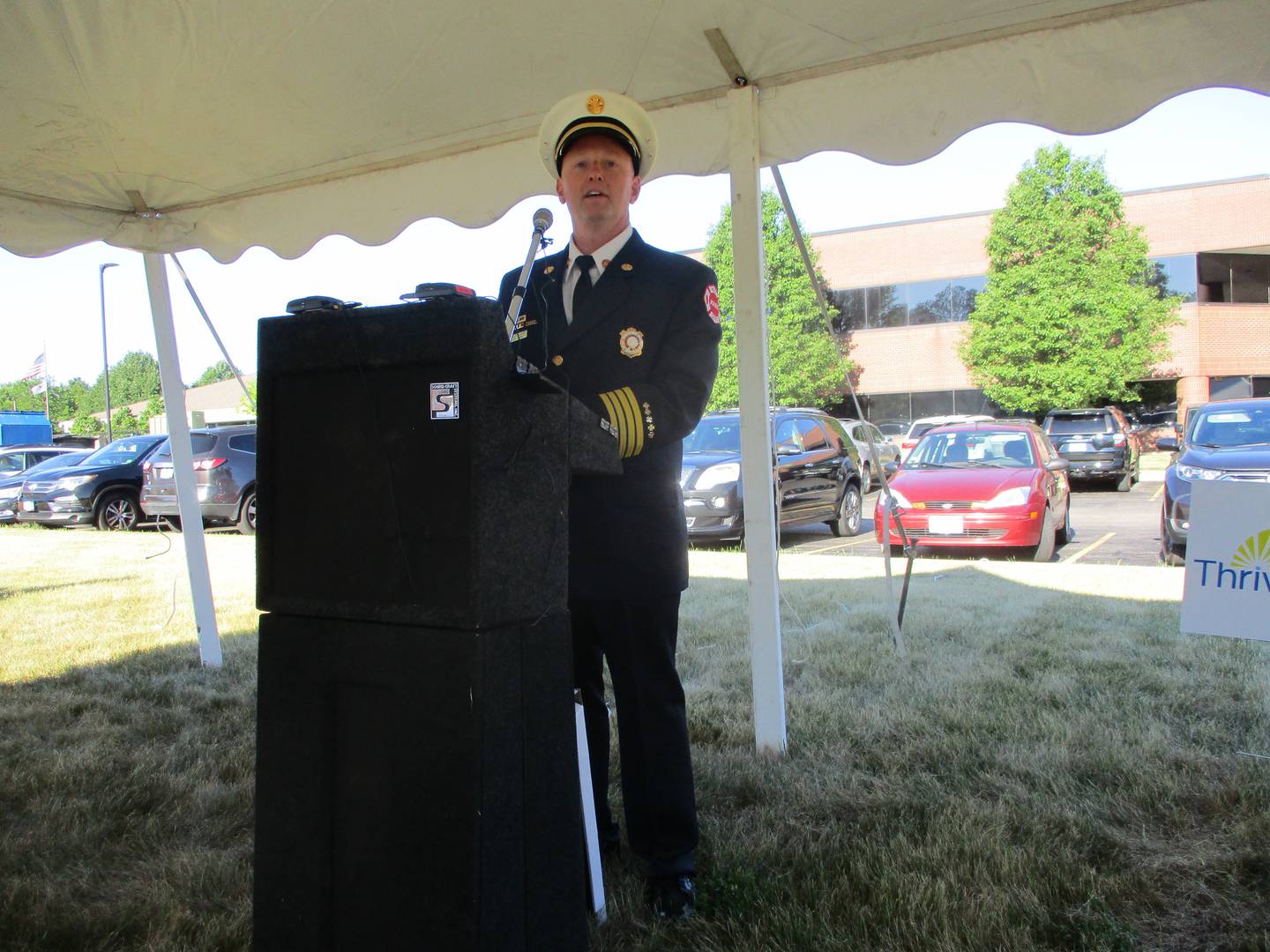Joliet Deputy Fire Chief Jeff Carey speaks at the ribbon-cutting ceremony on Tuesday, July 12, 2022 for the new Thriveworks mental health clinic in Joliet.