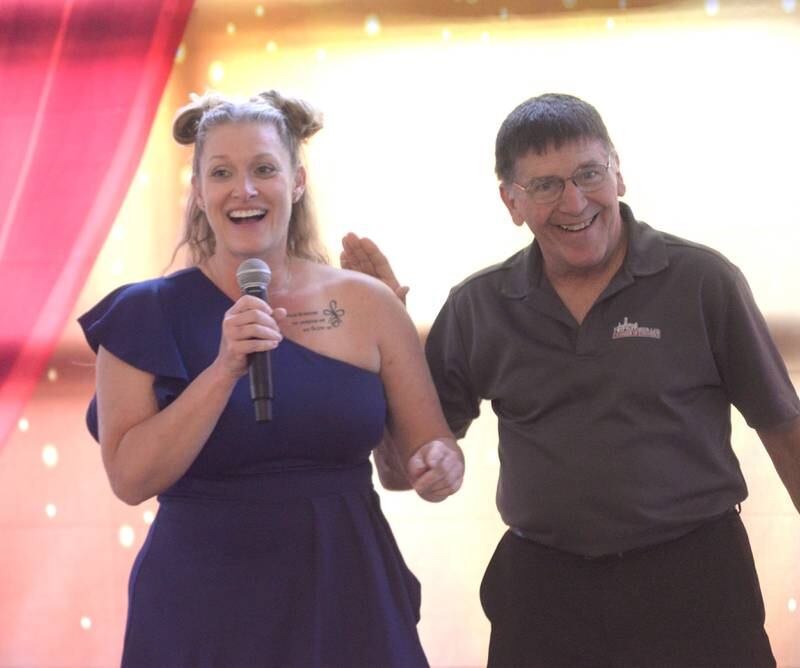 Oregon City Council member Terry Schuster presents the Civic Leadership Award to Trinda Fox of the Veterans Assistance Commission of Ogle County at the Oregon Area Chamber of Commerce Annual Dinner on Thursday, Aug. 15, 2024, at River's Edge Experience, Oregon.