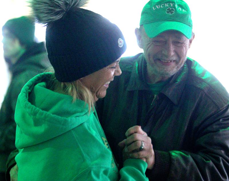 Mary Nallen, left, of Wheeling shares a dance with Gary O’Hanlon of McHenry at the ShamROCKS the Fox Festival in McHenry Friday, March 17, 2023.