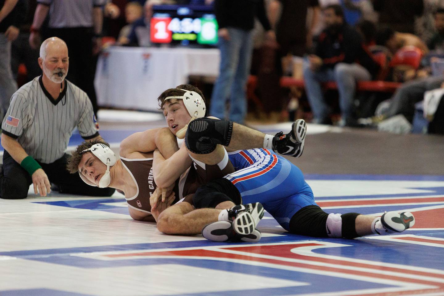 Marmion's Ashton Hopson and Mt. Carmel's Daniel Lynch competes in the 165 lb match  at the Marmion Class  2A Dual Team Sectional on Thursday, Feb. 5,2026 in Aurora.