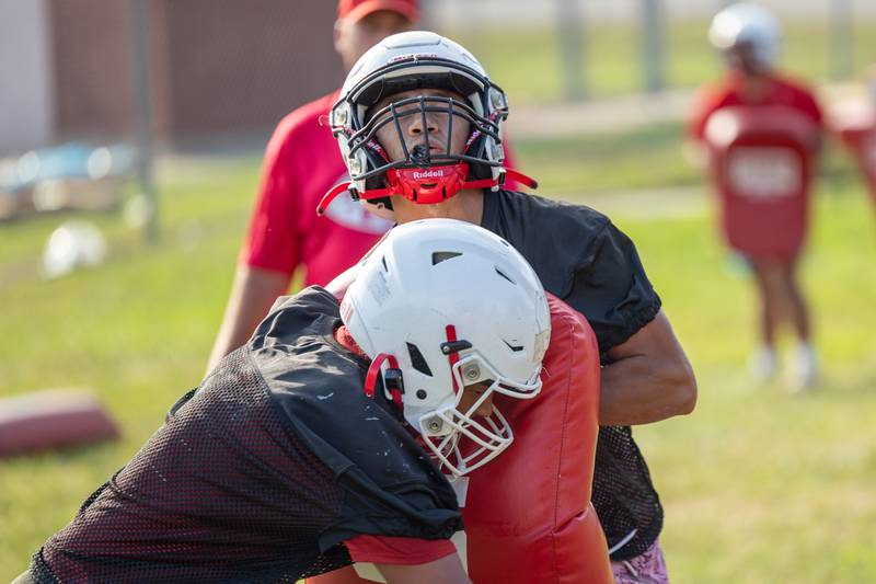 TJ Horton of Streator charges teammate Jesus Martinez during practice on Monday, August 11, 2025 at Streator High School in Streator.