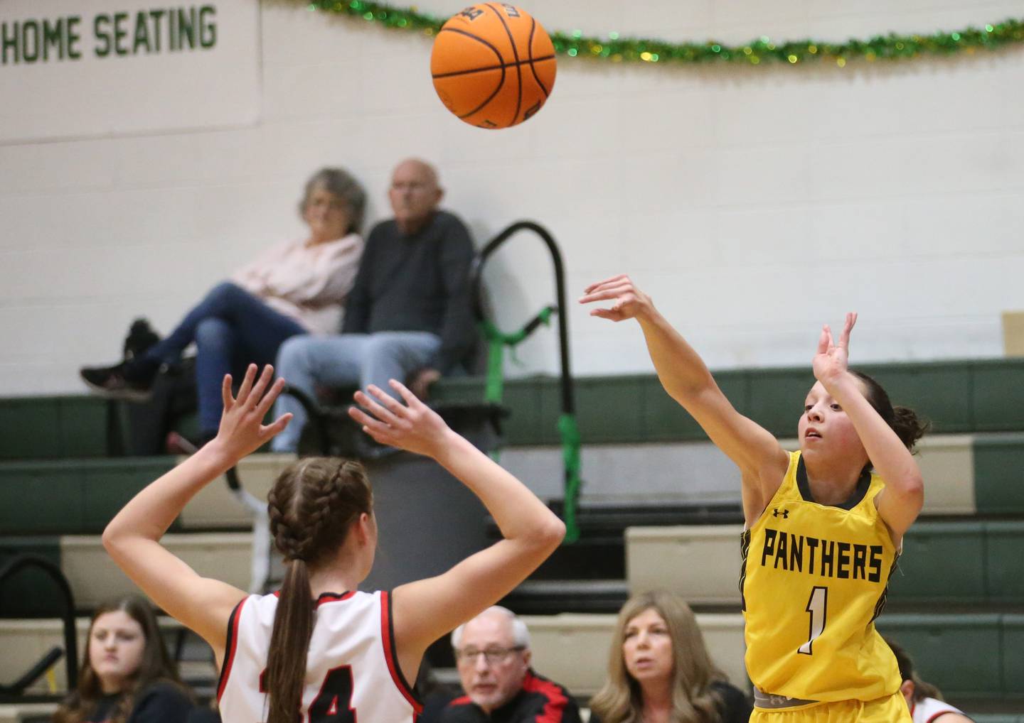Putnam County's Eme Bouxsein takes a shot over Amboy/Ohio's Bella Yanos during the Class 1A Regional semifinal game on Tuesday, Feb. 18, 2025 at St. Bede Academy.