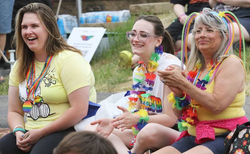 Robin Czapla, of McHenry; Merrily Ruetsche, of Carpentersville; and her mother, Marty, of Woodstock, watch the Drag Show during Lake County PrideFest on June 10 at the Round Lake Beach Cultural & Civic Center.