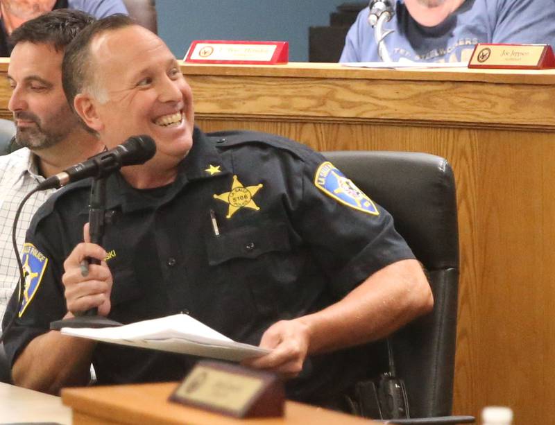 La Salle Police Chief Mike Smudzinski smiles while giving a farewell speech during the La Salle City Council meeting on Monday, Sept. 29, 2025. Smudzinski has been with the La Salle Police Department for 28 years and became Police Chief in 2020. Smudzinski officially retires on Oct. 10, 2025.