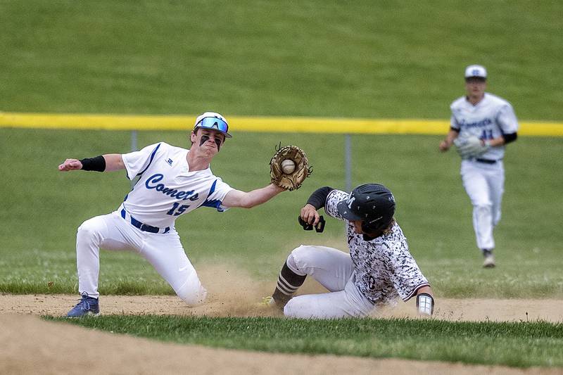 Newman’s Owen Frank takes the throw but is late against Marengo’s Quinn Lechner as he steals second Wednesday, May 28, 2025, in the Class 2A Sectional semifinal in Mendota.