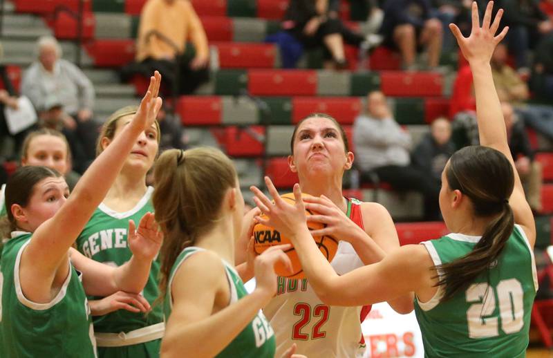 L-P's Brianna Ruppert eyes the hoop as Geneseo defenders swarm in the lane on Tuesday, Feb. 4, 2025 in AJ Sellett Gymnasium at L-P High School.