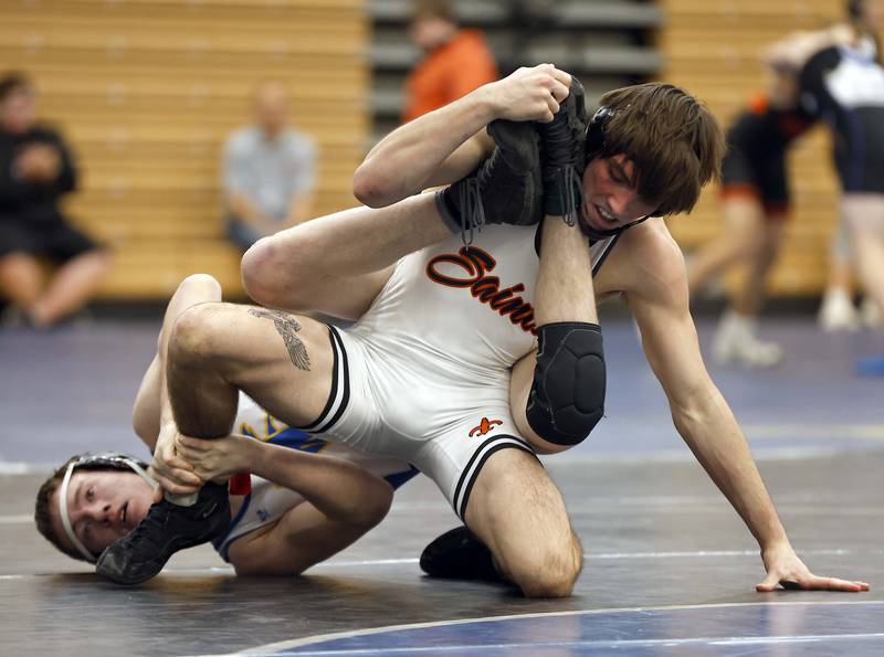 Wheaton North’s Thomas Fulton wrestles St. Charles East’s Ryan McGovern at 157-lbs at the 2025 DuKane Boys Varsity Tournament Saturday, Jan. 25, 2025 in St. Charles.