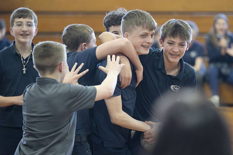 Sterling’s St. Mary eighth graders celebrate their dodgeball win Monday, Jan. 26, 2026, over Dixon’s St. Marys. The team took the overall win.