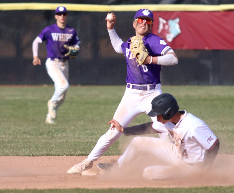 Hampshire’s Shane Pfeiffer forces out Prairie Ridge’s Karson Stiefer at second base in varsity baseball on Wednesday, April 16, 2025, at Prairie Ridge High School in Crystal Lake.