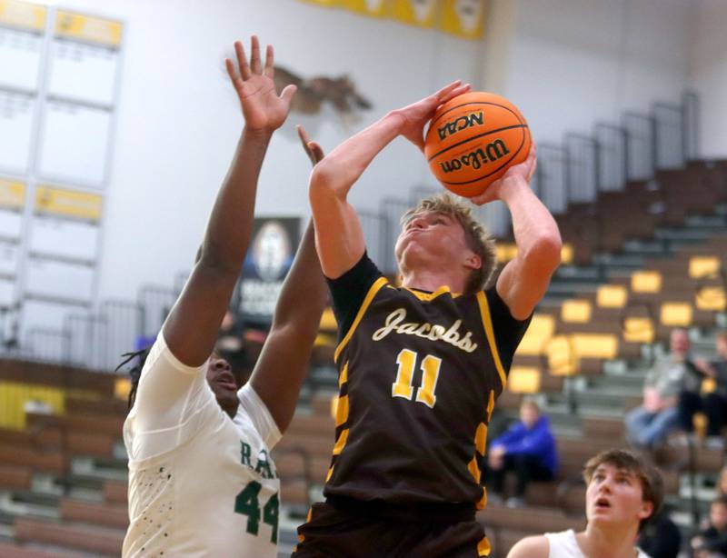 Jacobs’ Carson Goehring works under the net against Grayslake Central in varsity boys basketball Hinkle Holiday Classic action on Tuesday, Dec. 23, 2025, at Jacobs High School in Algonquin.