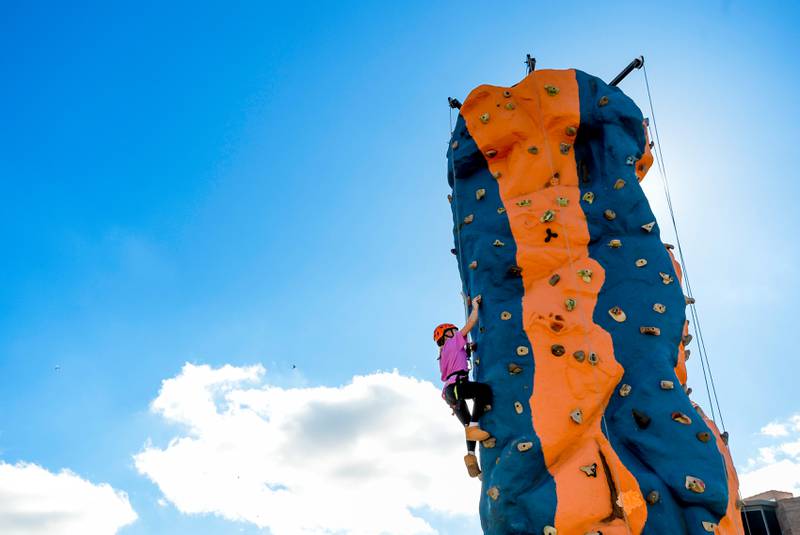 Area scouts set up a climbing wall at the annual Scarecrow Festival on Saturday, Oct 11, 2025 in St. Charles.