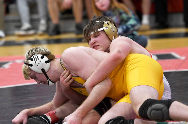 Oregon's Jacksyn Windham tries to wrap up Lena-Winslow's Oliver McPeek in the 215-pound championship match at the 1A Stillman Valley Regional on Saturday, Jan. 31, 2026.