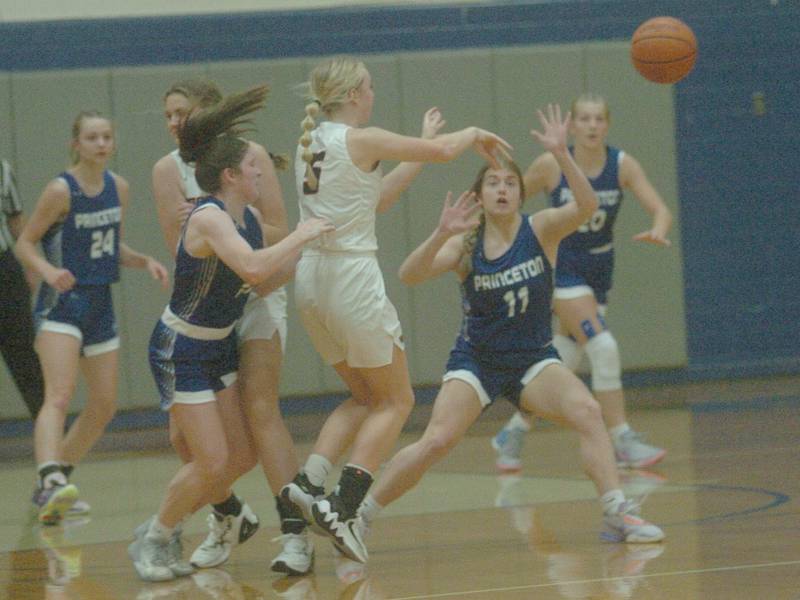 Princeton's Camryn Driscoll (left) and Makayla Hecht (11) defend against Erie-Prophetstown in Saturday's championship game of the Princeton Holiday Tournament.