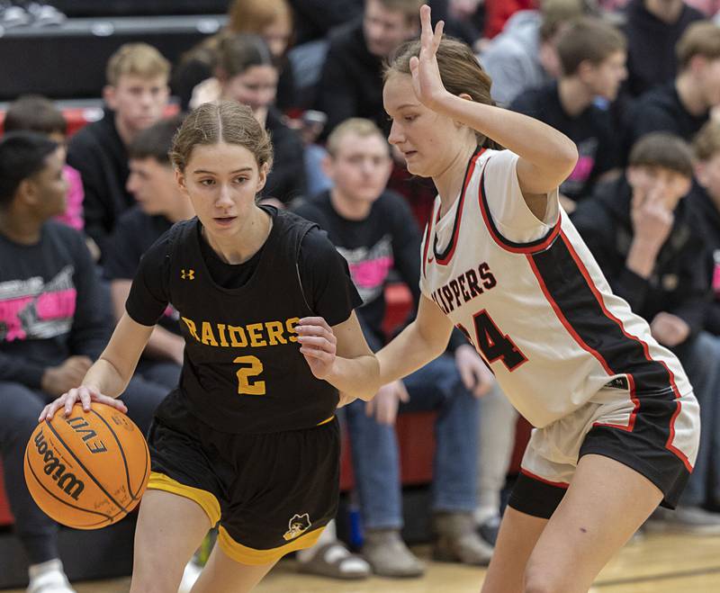 AFC’s Drew Dawson handles the ball against Amboy’s Bella Yanos Tuesday, Jan. 27, 2026.