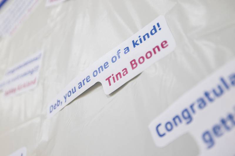 Notes wishing Deb Mortonson well are posted Wednesday, Dec. 17, 2025, at her retirement party at the Sterling/Rock Falls YMCA.