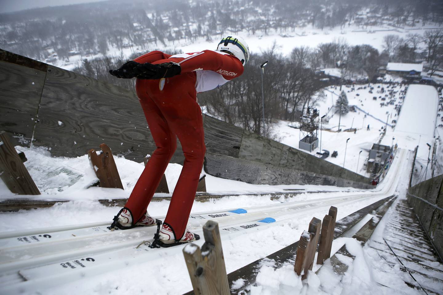 Stewart Gundry jumps while competing in the 116th Norge Annual Winter Ski Jump Tournament at the Norge Ski Club in Fox River Grove, Ill., on Sunday, Jan. 31, 2021.
