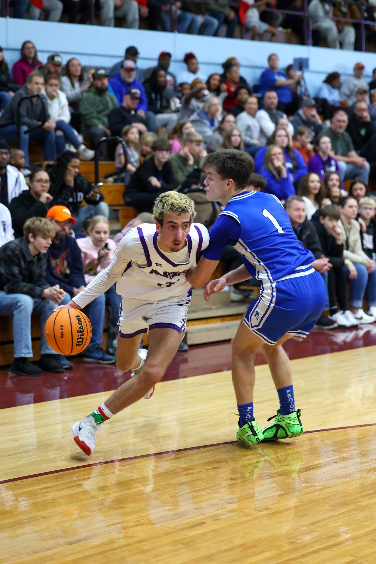Manteno's Braden Campbell drives against Peotone's Alex Chenoweth during the Panthers' 60-49 victory over Peotone in the 75th Kankakee Holiday Tournament opening round on Friday, Dec. 26, 2025.
