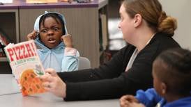 Photos: DeKalb's Mitchell Elementary School teachers connect with students in the library
