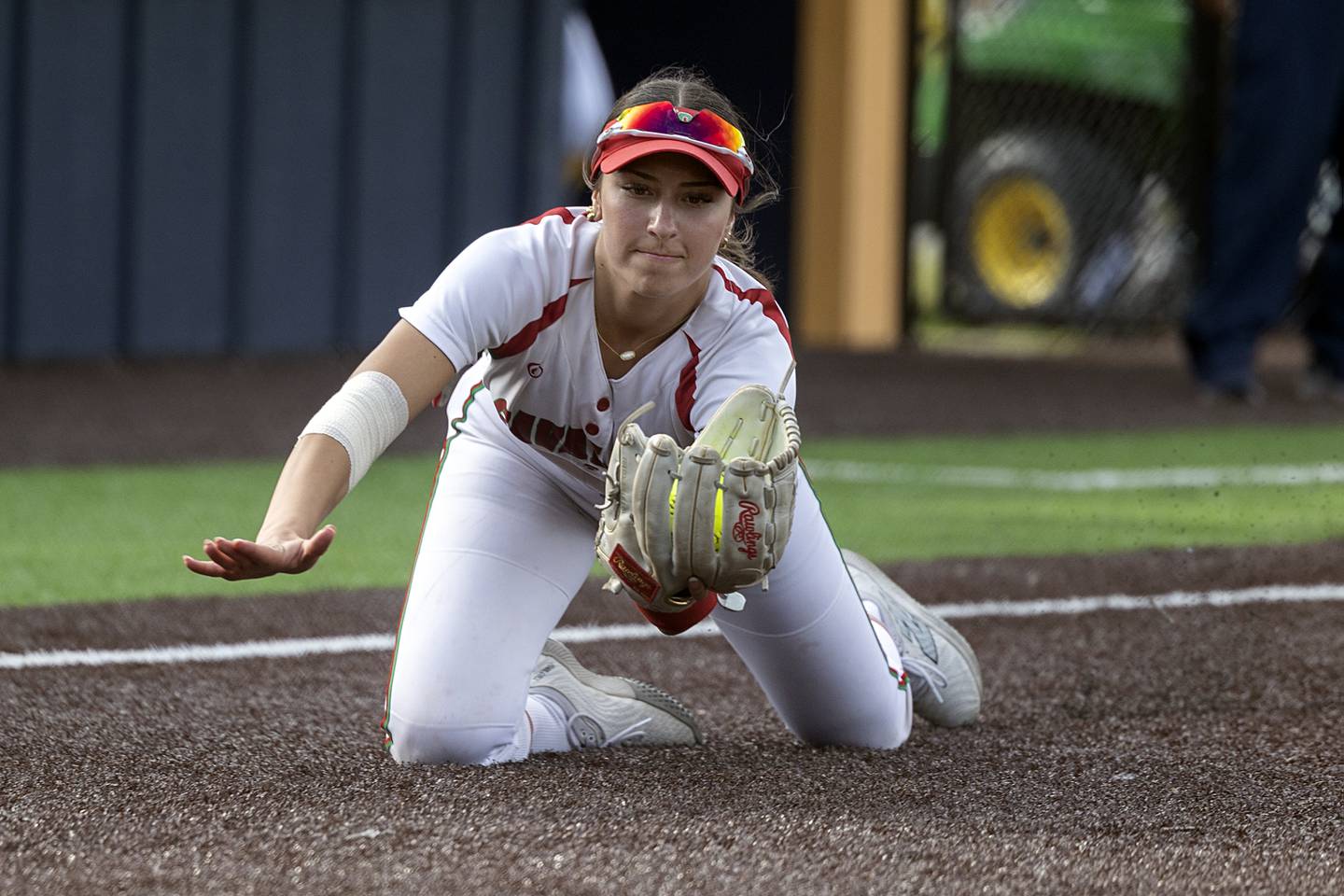 Lasalle-Peru’s Anna Riva makes a diving catch on a bunt and turns it into a double play against Sterling Tuesday, May 19, 2026, at the Class 3A softball regionals at Sterling.