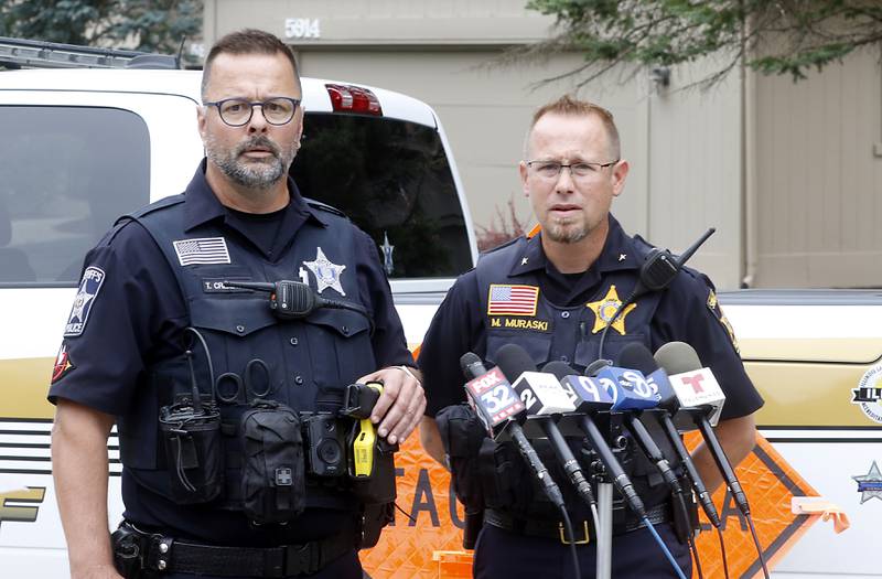 Tim Creighton, from the McHenry County Sheriff's office, (left) and Chief of Operations Mike Muraskey give an update on a domestic incident in which four people were killed on Wednesday Aug. 9, 2023, in the 5800 block of Wild Plum Road in unincorporated Crystal Lake. Police later said they were family members.