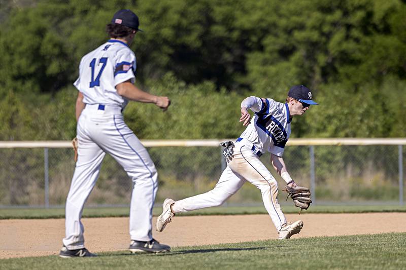 Burlington Centrals’ Brady Gilroy fields a ball at shortstop against Dixon Thursday, May 25, 2023 during a class 3A regional semifinal in Rochelle.