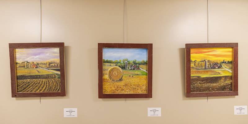 A trio of works show the same farm on a stretch of road at different times of the day, from Laura Readdy's gallery at CGH Medical Center in Sterling.