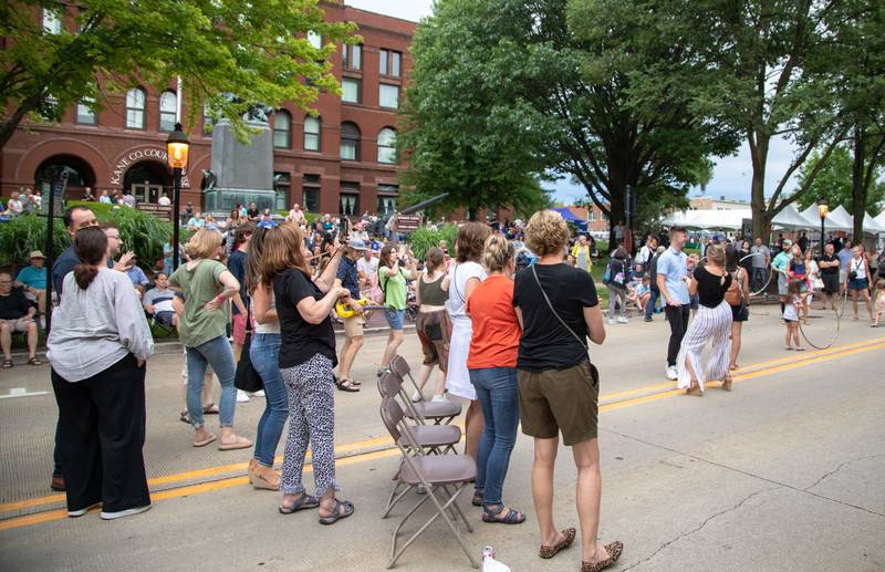 Swedish Days attendees dance and clap to music performed by the band Necessary Diversion on Saturday, June 25, 2022.