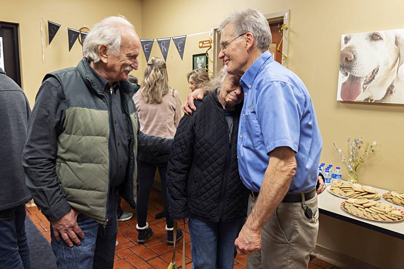Sue Pfleger of Oregon gets emotional as she and husband Al wishes well to retiring veterinarian Dr. Bill Kuhfus Thursday, Dec. 28, 2023 at the River Ridge Animal Hospital.