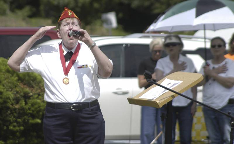 Theresa Heffelfinger sings "The Star Spangled Banner" at a ceremony in Rock Falls on Monday, May 25, 2026.