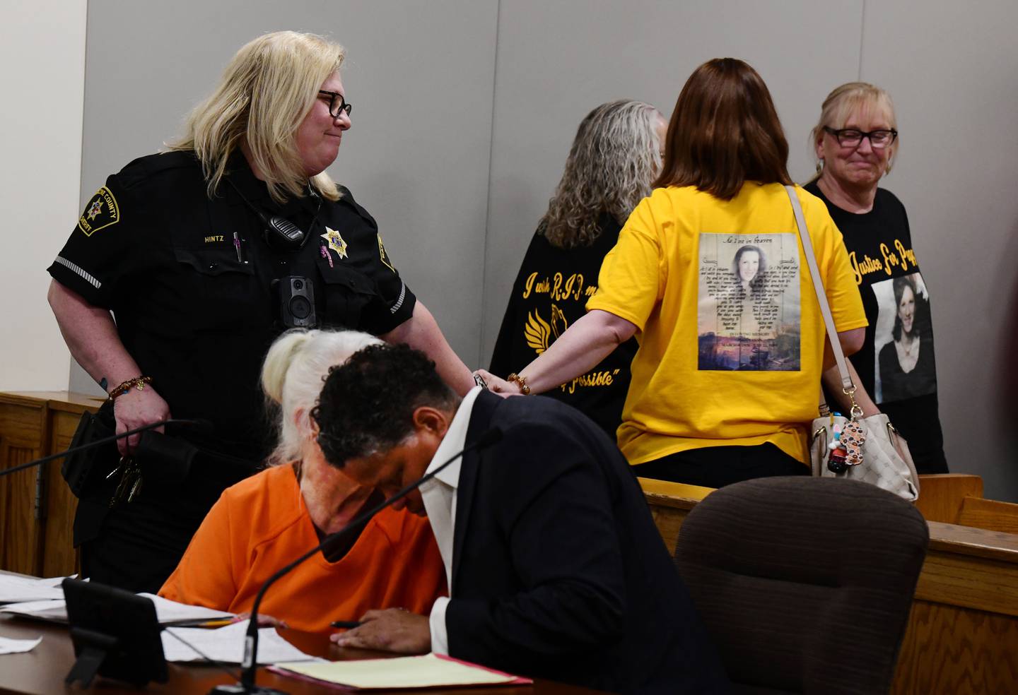 Relatives of Peggy Lynn Johnson-Schroeder walk behind Linda La Roche after La Roche was sentenced Monday May 23, 2022, in Racine County to life in prison without parole for the killing of Johnson-Schroeder in 1999 and a consecutive five-year sentence for concealing a corpse.