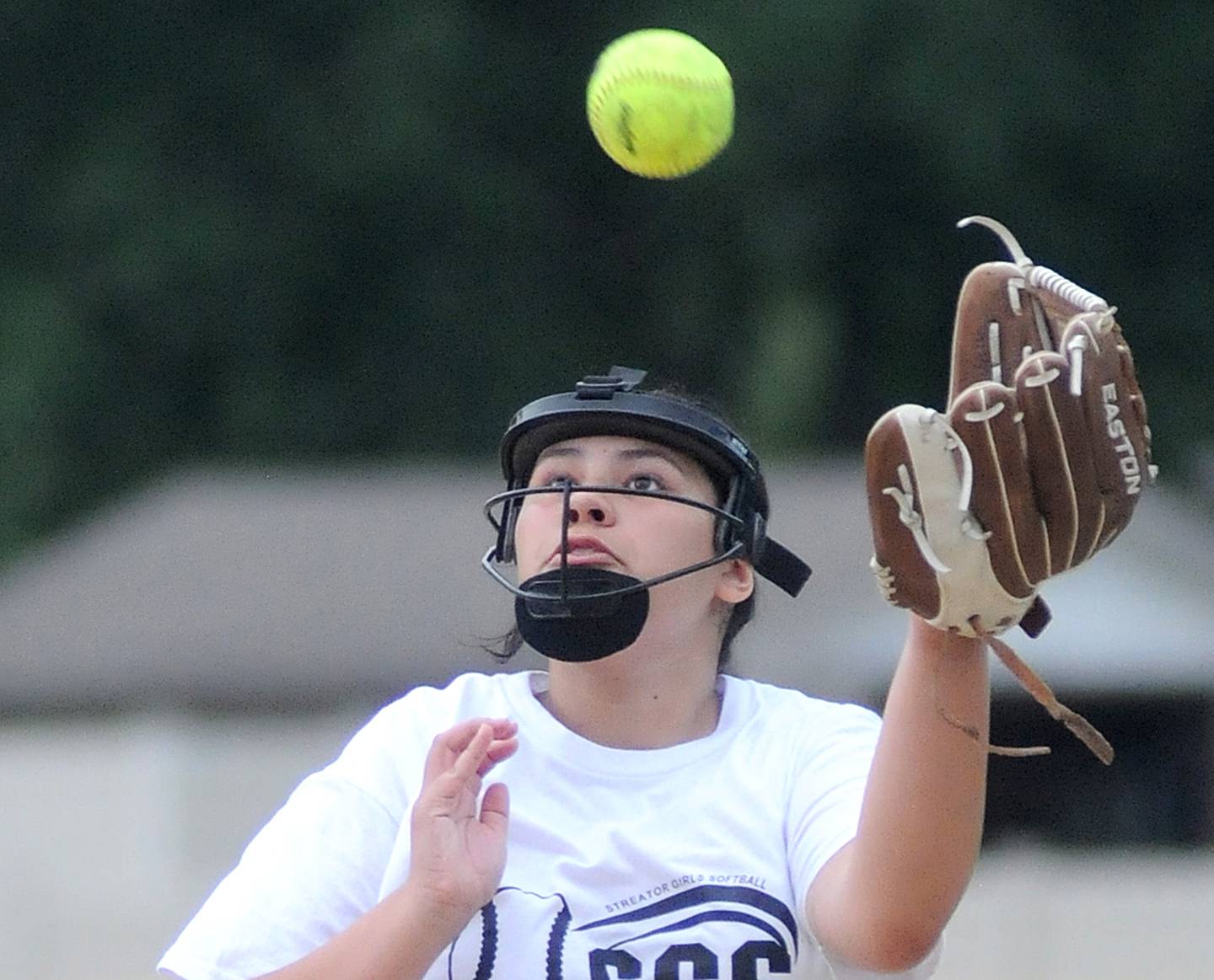 MJ Track Works shortstop Emma Vasquez makes a catch in the Streator Girls Softball 12-15 championship game against American Family Insurance at Bodznick Park on Friday, July 14, 2023.
