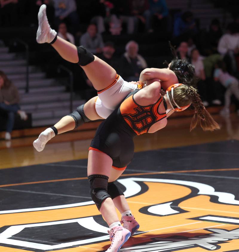DeKalb’s Kara Zimmerman takes down Kaneland’s Chloe Cervantes during their 135 pound match Wednesday, Jan. 7, 2026, at DeKalb High School.