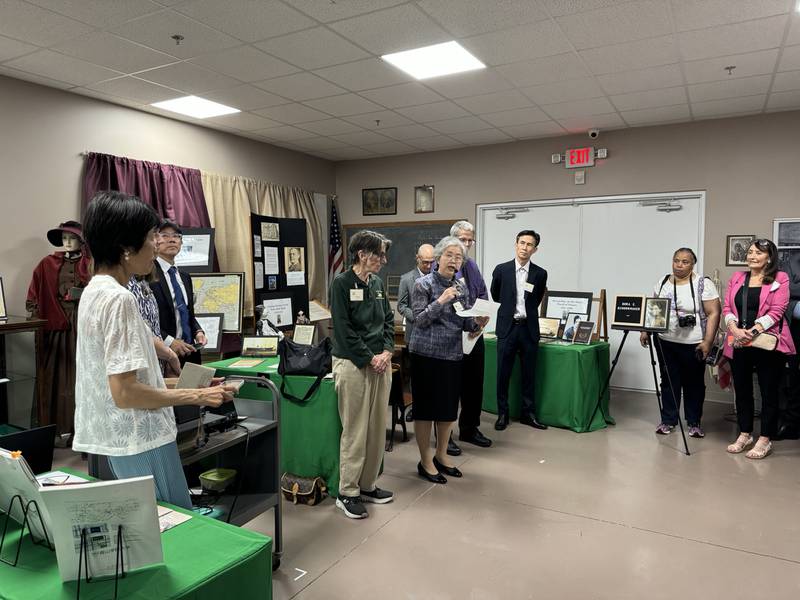 Reverend Keiko Tanamura, the author of "Dora E. Schoonmaker, a Life Truly Lived by God's Grace," addresses the crows at the Grundy County Historical Society Museum on Saturday.