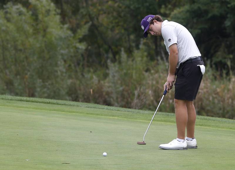 Hampshires’s Eric Brown putts on the fifth green during the IHSA Class 3A Hampshire Regional golf tournament on Wednesday, Sept. 27, 2023, at Randall Oaks Golf Club in West Dundee.
