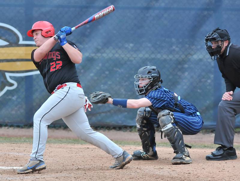 Benet's Tyler Dean hits a single the seventh inning that would start a three run rally to tie the game against Nazareth during a game on Apr. 12, 2022 at Nazareth Academy in LaGrange Park.