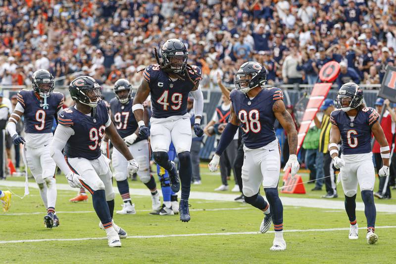 Chicago Bears linebacker Tremaine Edmunds (49) celebrates after a defensive stop against the Los Angeles Rams during the second half of an NFL football game, Sunday, Sept. 29, 2024, in Chicago. The Bears defeated the Rams 24-18. (AP Photo/Kamil Krzaczynski)