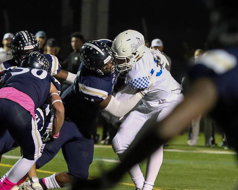 IC Catholic Prep's Jayden Sutton (54) makes a tackle during varsity football game between St Francis at IC Catholic Prep.  Oct 21, 2022.