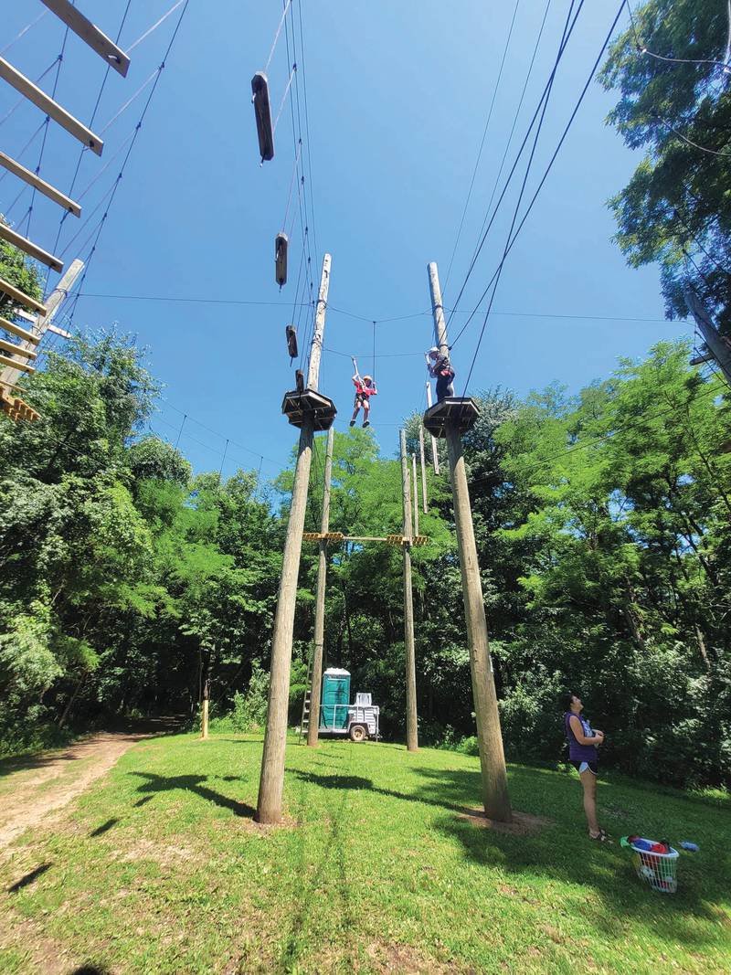 Echo Bluff Park, enclosed in the woods in rural Spring Valley, offers a zip line and challenge course.