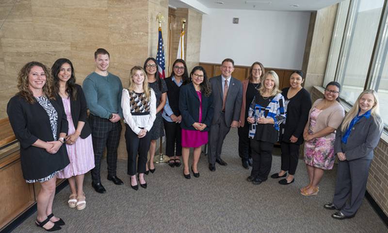 Jacquelyn Reidy (from left), Melissa Cisneros, Brandon Mabrey, Maggie Sarauer, Maria Villareal, Zaira Herrera, Jacqueline Herrera Giron, Eric Rinehart, Melissa Burke, Jennifer Bishop Jenkins, Susana Perez, Vanessa Vargas Ramirez and Kim Clark.
