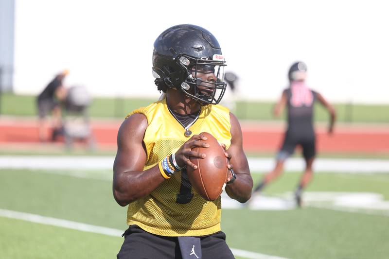 Joliet West’s Carl Bew looks to pass at the Morris 7 on 7 scrimmage. Tuesday, July 19, 2022 in Morris.