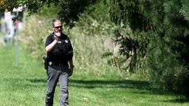 Photos: Investigation continues after body recovered from DeKalb pond