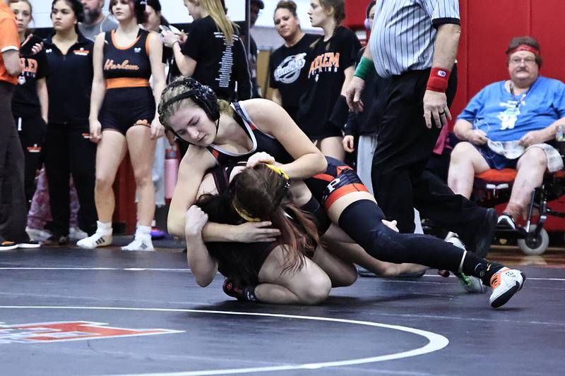 Erie-Prophetstown's Robin Stephens working to turn her opponent from East Peoria Izy Poranto at the 125 pound weight class. The EP Panthers welcomed 27 other teams to their first annual Girls Wrestling Invite on Saturday, Jan. 10, 2026, in Erie.