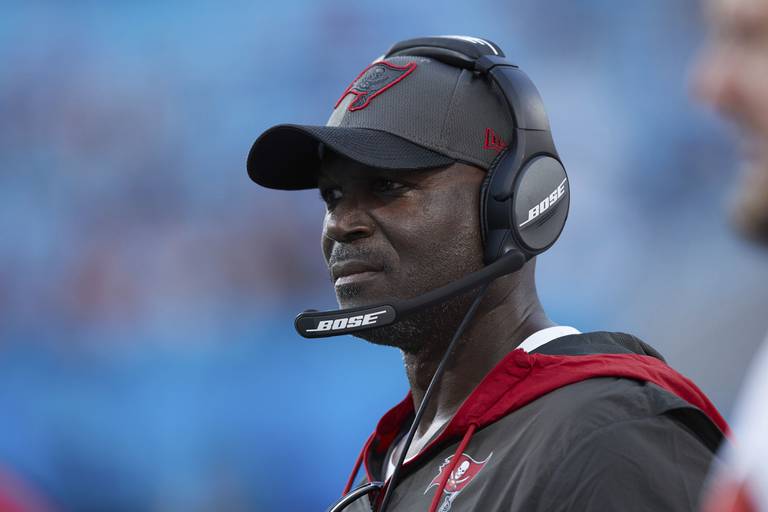 Tampa Bay Buccaneers defensive coordinator Todd Bowles watches from the sideline during a game against the Carolina Panthers, Sunday, Dec. 26, 2021, in Charlotte, N.C.
