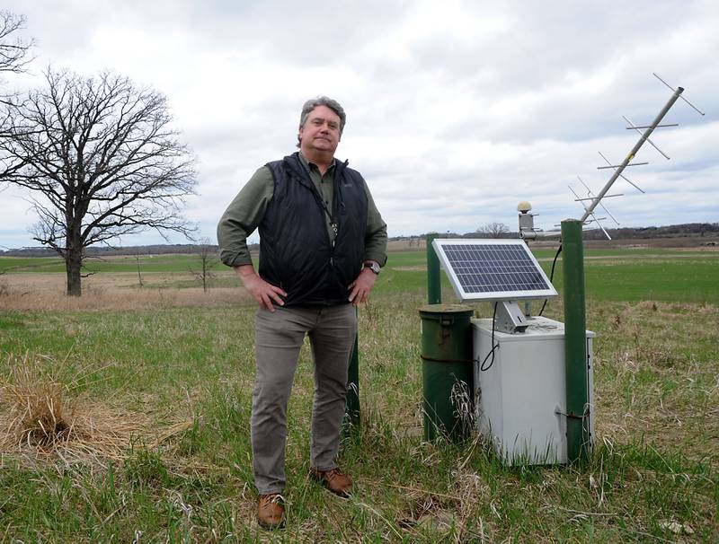 Scott Kuykendall, a water resources specialist with the McHenry County Planning and Development, stands next to one of 37 water monitoring wells near Richmond on Monday, May 2, 2022. Wells are showing more drawdown after a two-year drought, in particular in Huntley and Harvard.