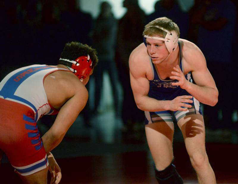 Newman's Daniel Kelly (right) gets ready to make a move on Oregon's Andrew Young in the 175-pound match at the 1A team sectional held Tuesday, Feb. 25, 2025 in the Blackhawk Center in Oregon.