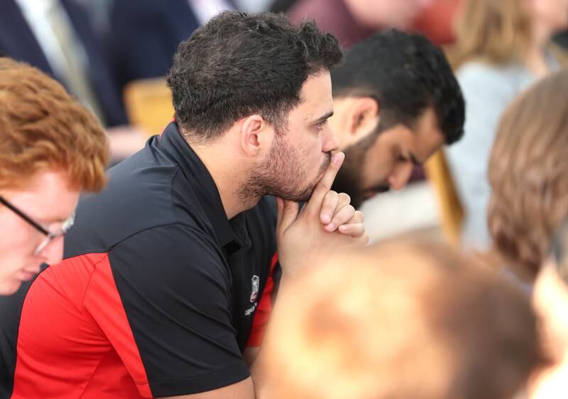 An attendee listen to speakers during the informational meeting Thursday, May 18, 2023, at New Hope Missionary Baptist Church in DeKalb. The meeting centered on the the proposed plans for the vacant lot on the corner of Blackhawk Road and Hillcrest Drive in DeKalb.